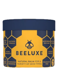 Beeluxe natural balm container with blue lid and yellow label on a yellow background