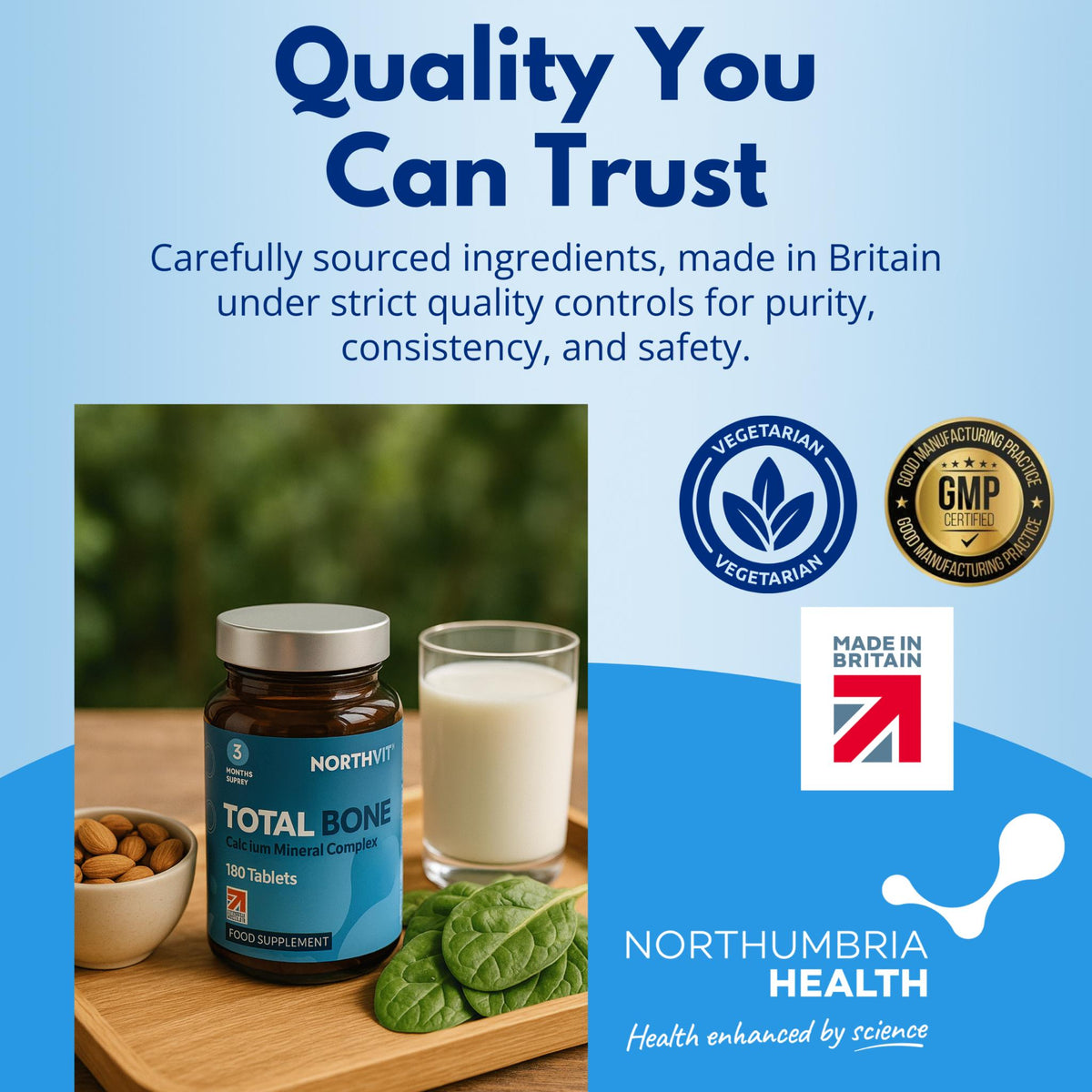 Northumbria Health Total Bone supplement bottle next to a glass of milk, almonds, and spinach.