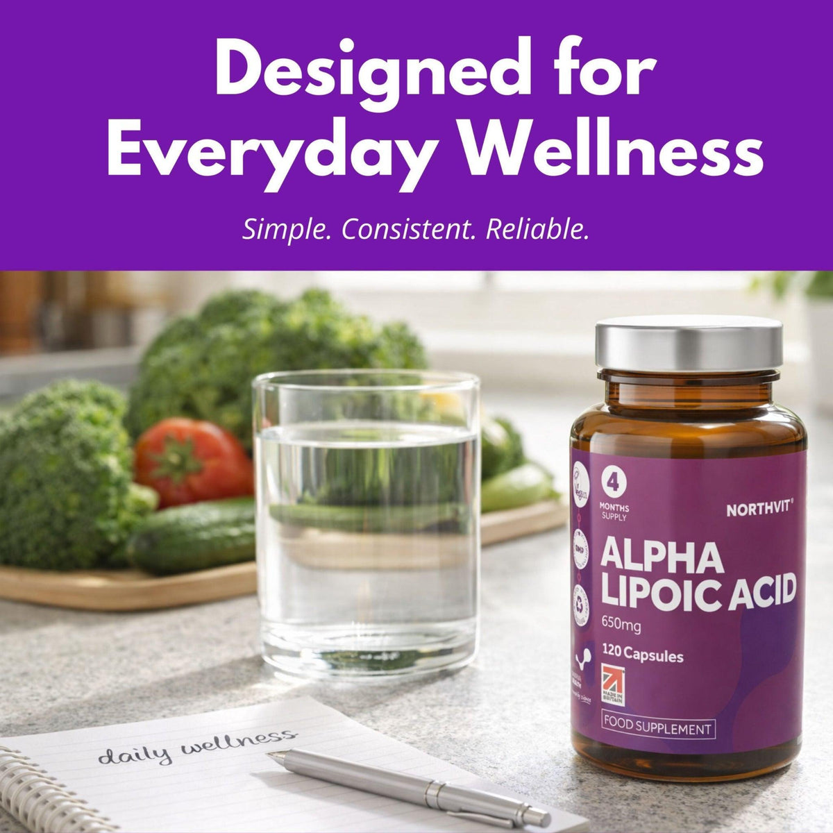 Northvit Alpha Lipoic Acid 650mg bottle next to a glass of water and fresh vegetables.