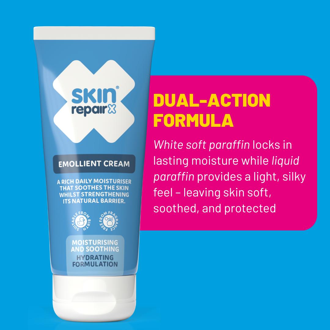 SkinRepairX Emollient Cream blue squeeze tube with dual-action formula details on a pink background.