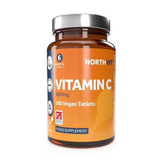 Northvit Vitamin C 1000mg 180 vegan tablets in an amber glass bottle with orange label.