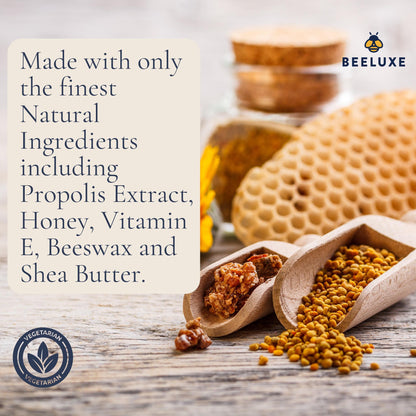 Beeluxe natural skin balm ingredients with honey, beeswax, and propolis on a wooden background.
