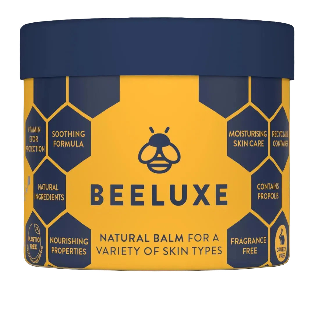 Beeluxe natural skin balm in a yellow and blue tub with honeycomb design.